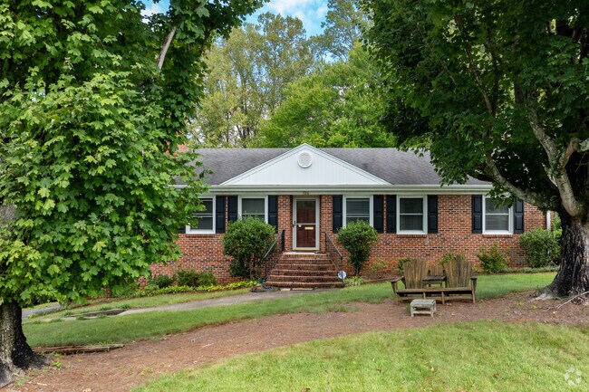 Many homes in Sandusky are shaded by mature trees on large lush green lots.