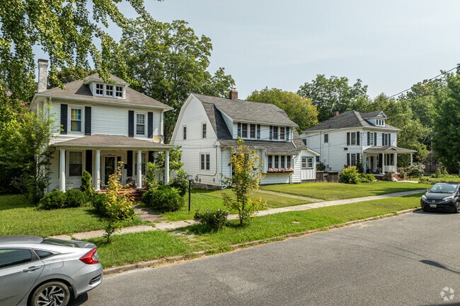 A Swedish Colonial home is flanked by two American Foursquares in North Camden.