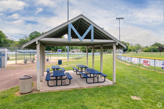 Pfeiffer Community Center features a covered seating area.