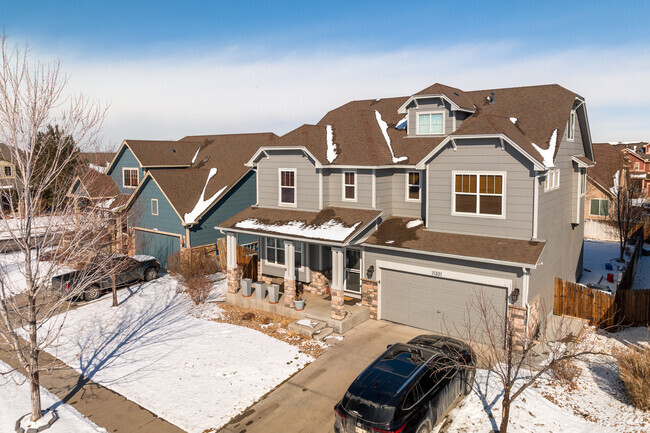 This Hazeltine home has rounded gables, and fewer craftsman details.