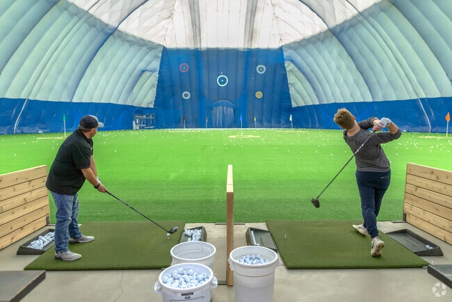 Master your game indoors at the Golf Dome's world-class golfing center.