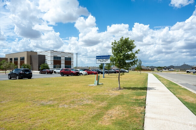 Students are welcomed by the well maintained grounds at Dyess Elementary School.