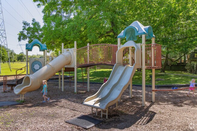 Kids are free to be kids on the playground at Forgey Park in Germantown.
