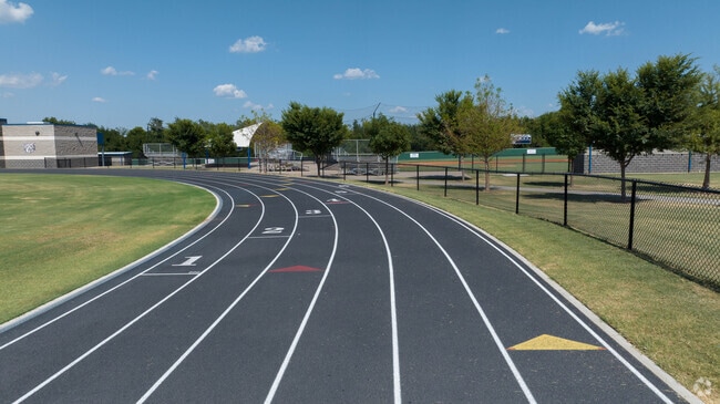The track is a full 8-lane track at Star Spencer High School in Spencer, OK.