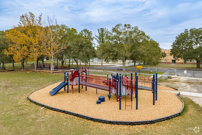 Kids enjoy playing on the play area at Maniscalco Elementary School.