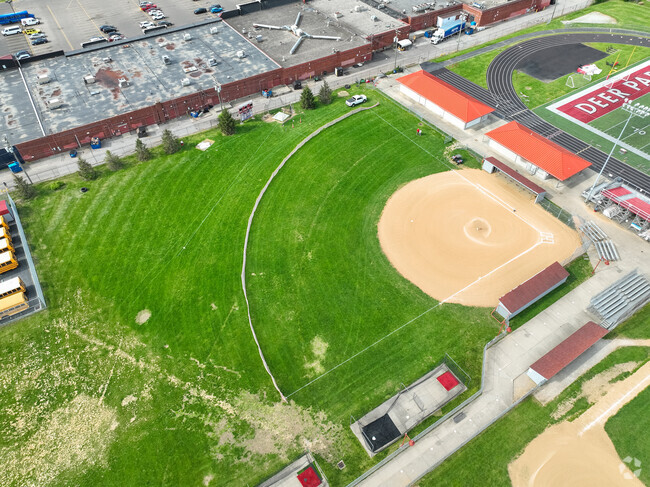 Students enjoy practicing their skills on the baseball field.