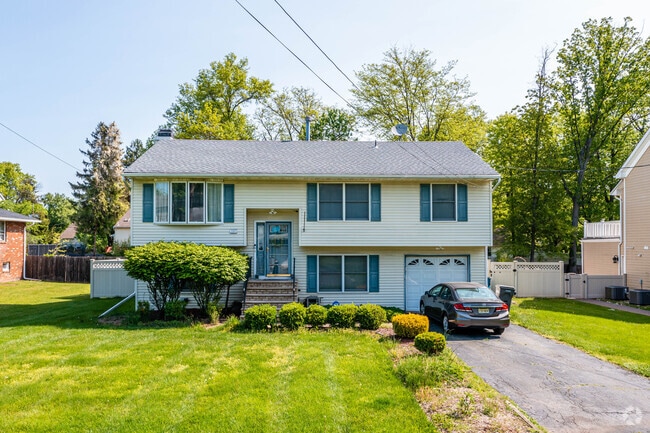 This raised ranch-style home is ideal for a family just getting started in Piscataway, NJ.