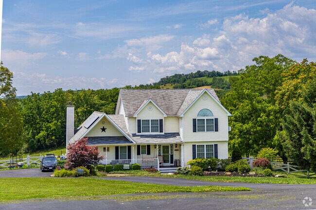 Escape to the serene rural areas of Minisink, where expansive estates boast stunning landscapes.