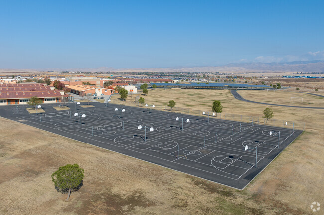 The basketball courts at Paul L Cato overlook the track field.