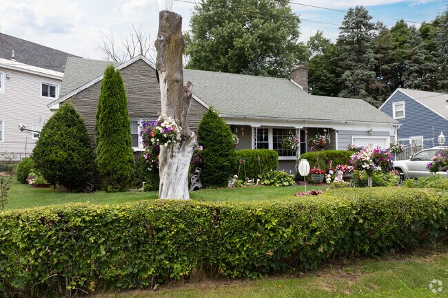 A lovely garden shines on this great ranch style home in Mont Pleasant.