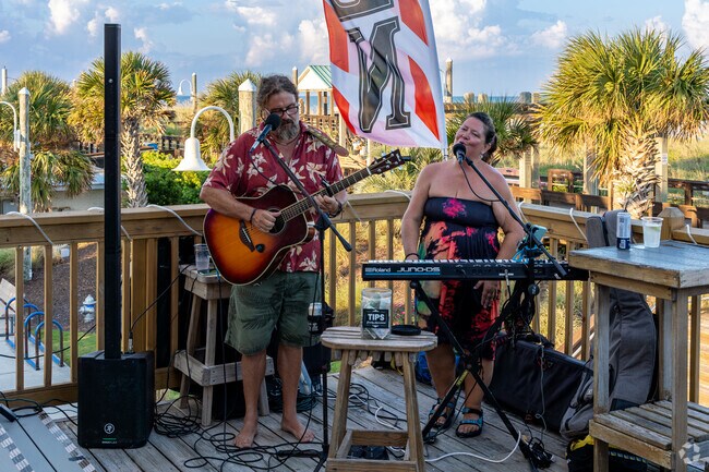 You can enjoy live music at places like Hurricane Alley at Carolina Beach.