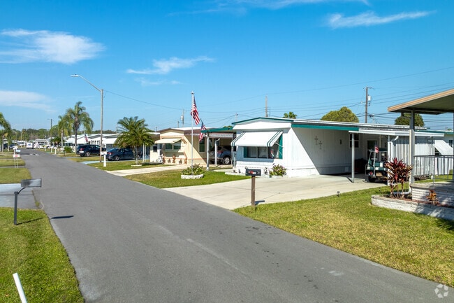 Enjoy the simple life, where golf carts are your normal transportation in Holiday Park.