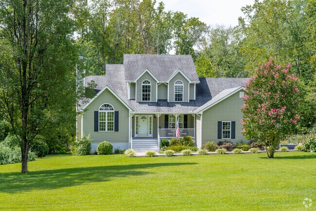 An American Tradition style house sits on a large estate in Cismont.