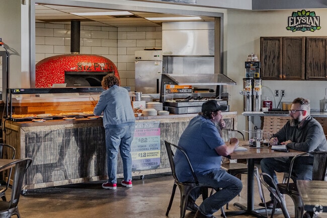 Restaurants and other eateries have all cropped up in Main Street's historic, Latinate buildings like 812 Pizza.
