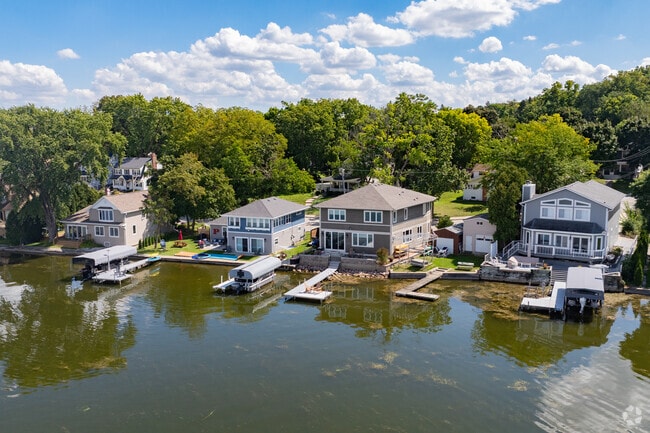 Many Pewaukee Village homes have private docks in their backyards for recreational use.