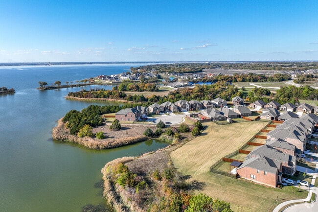 You can find some captivating homes in Travis Ranch located by Lake Ray Hubbard.