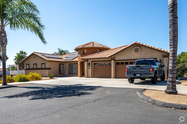 In Canyon Ridge, a magnificent Spanish Revival single-family home stands prominently.