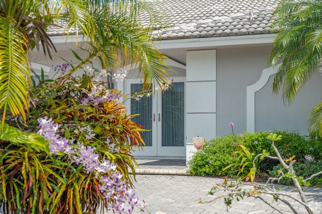 Single-family homes in The Woodlands offer lush landscaping.