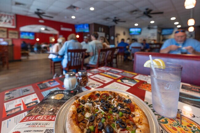 The hand tossed pizza is the star of the show at Semmes House of Pizza near Camelia, AL.
