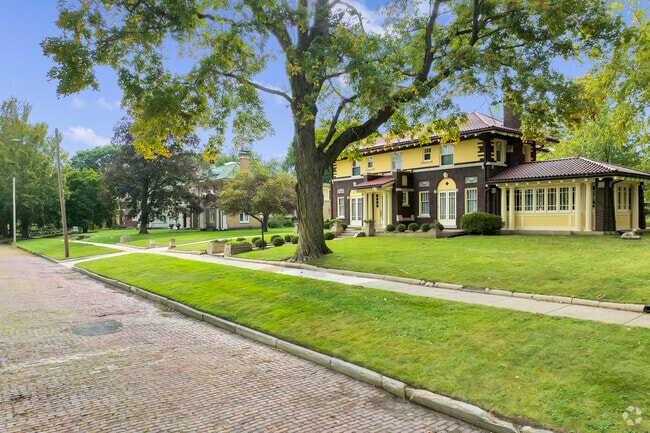 Stroll along brick-lined streets to see the unique historic homes of Millikin Home.