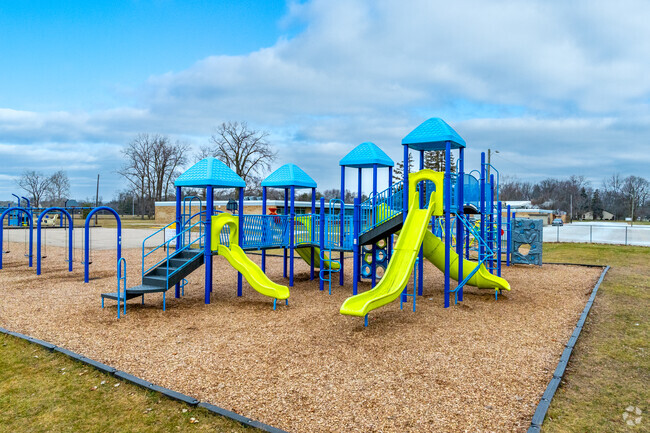 Children enjoy modern and fun playground equipment at Webster Elementary School.