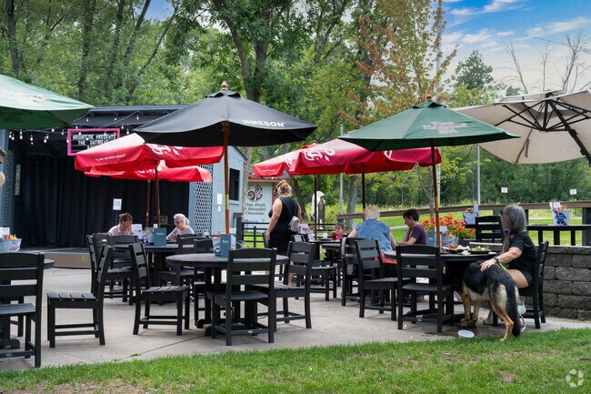 Guests enjoy outside dining and live music at Brookside Bar and Grill.