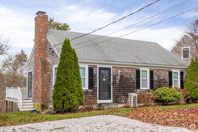 Cape Cod architecture reflects the neighborhood’s coastal New England roots.