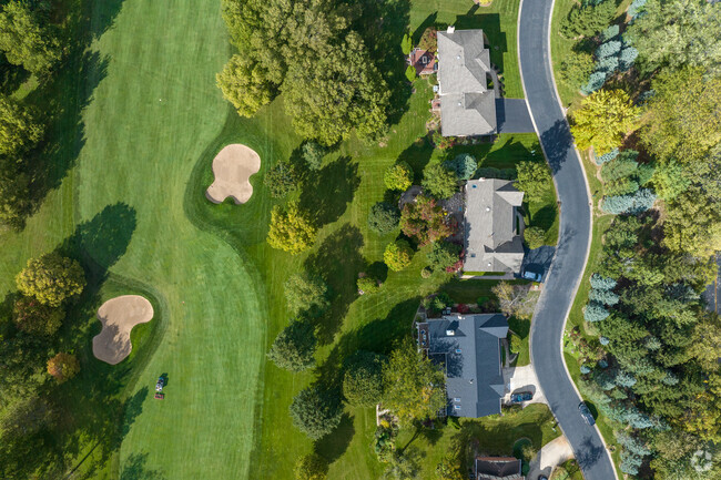 Prestwick Country Club is lined by rows of large homes and large green yards in Prestwick.