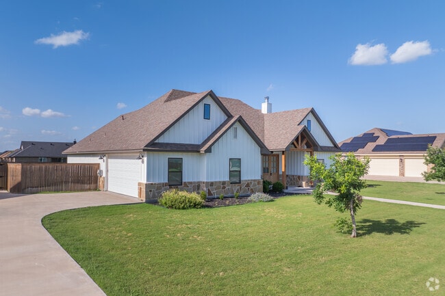Clean lines and warm accents define this inviting farmhouse-style home in Potosi City.