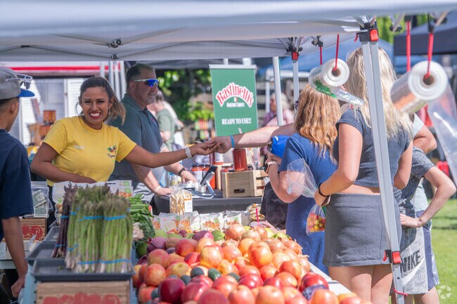 Fresh produce fills vendor stalls at The Waterfront Farmers Market.