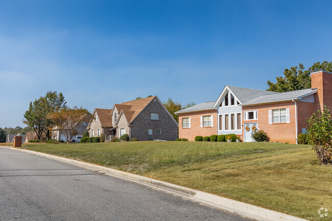 Some of Maple Grove homes are lined along quiet street with neighbors near by.