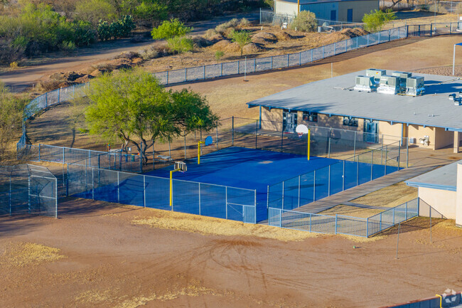 Sopori Elementary School includes fenced-in outdoor spaces like this multi-use court for student recreation.
