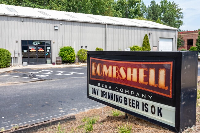 This sign don't lie! Come hoist a pint or two at Bombshell Beer Company in Holly Springs.
