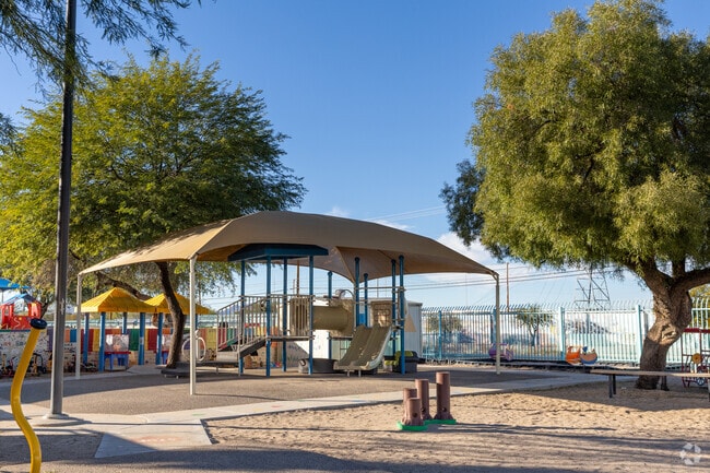 students enjoy the new outdoor covered playground at Ocotillo Early Learning Elementary