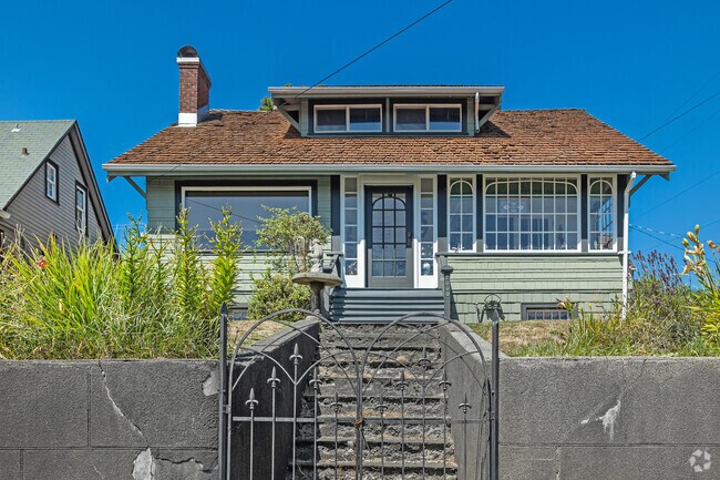Crafstman bungalows offer a rustic living experience among the forest vibe of West End, WA.