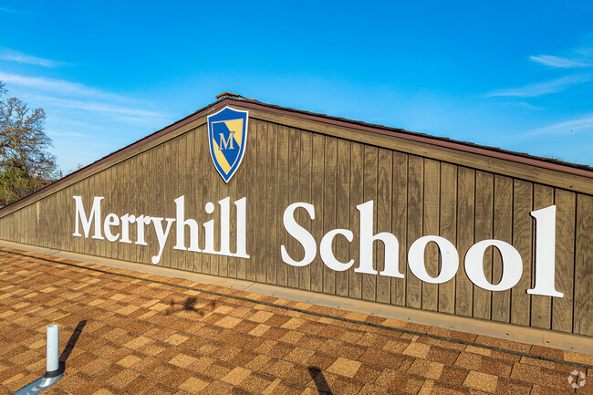 Merryhill Elementary & Middle School sign can be seen from the roadway.