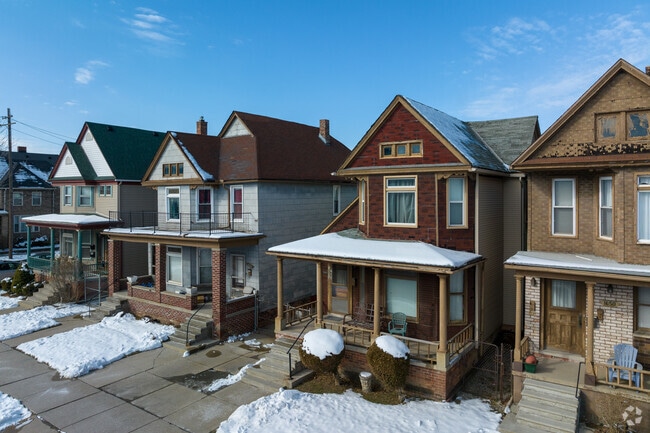 The Corktown neighborhood is lined with two-story historic homes.