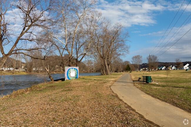 Take a walk alongside the Watagua River at Riverside Park near Biltmore.