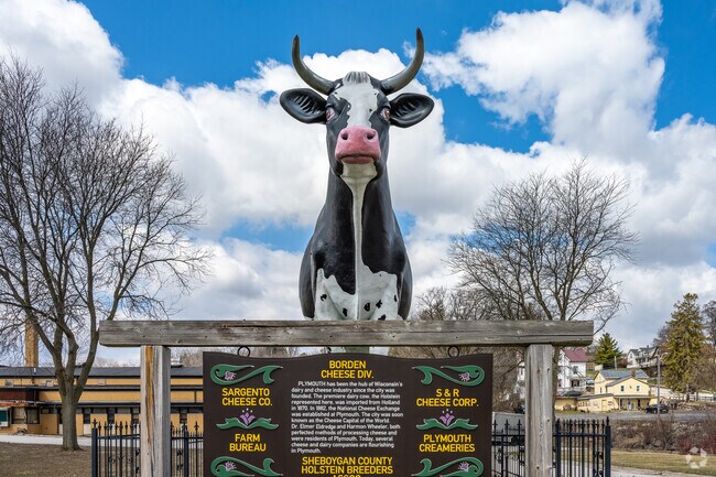 Plymouth celebrates its cheese making history with the Antoinette Dairy Cow Statue.