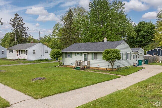Several small ranch-style homes are scattered across Averill Park in Averill Woods, Lansing.