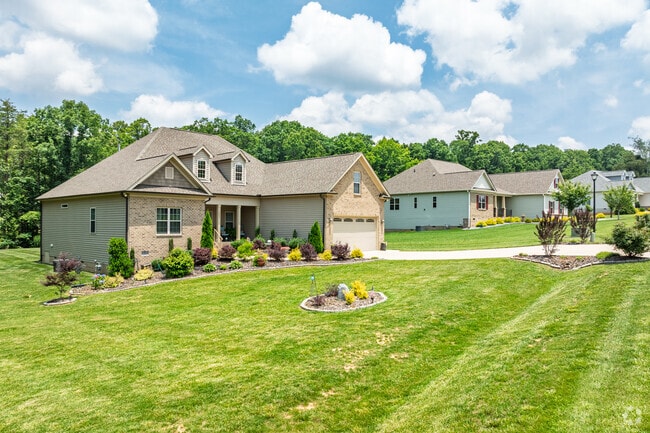 New Traditional homes line manicured lawns in a peaceful residential neighborhood in Browns Summit.