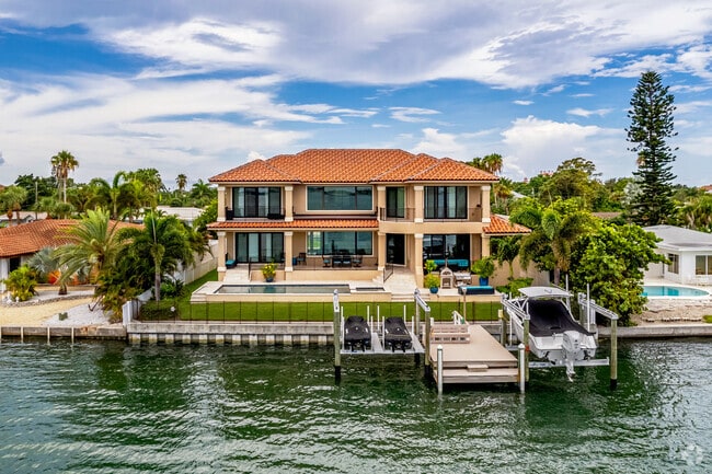 Beautiful Spanish revival estates line the waters edge in St. Pete Beach neighborhood.