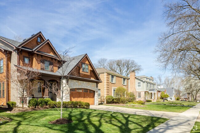 Different home styles in Ridge Acres complement the sidewalks and suburban lifestyle.