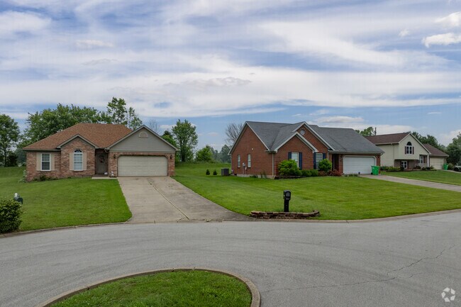 This row of homes in Greenville has craftsman style accents and brick facades.