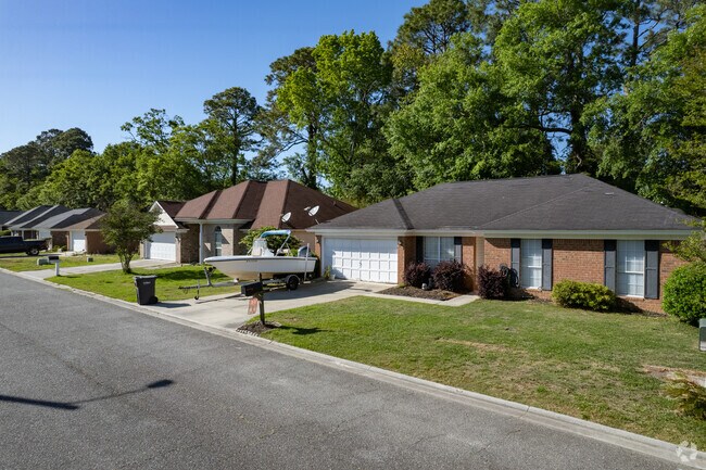 Brick ranch style homes line the residential streets of Sandfly.