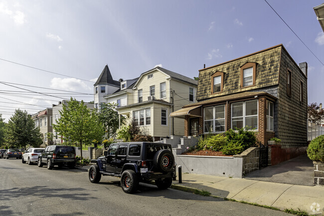 Homes of differing shapes and sizes are represented here in Olinville.