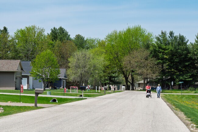 Wide residential streets invite family walks in Brice Prairie.