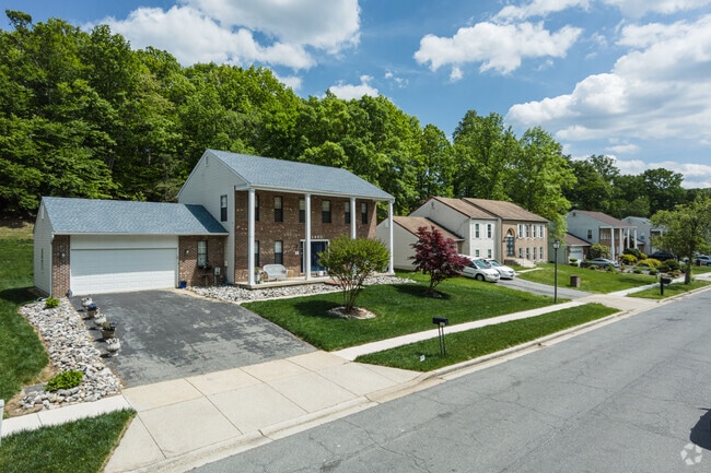 Windbrook’s streets are lined with single-family homes featuring spacious yards and driveways.