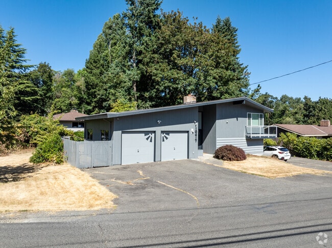 Two-car garage and staggered rooflines define this split-level home in Boulevard Park.