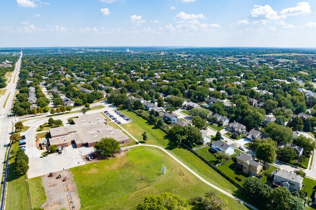 Lindenwood is an aptly named neighborhood of rolling hills and dense, mature trees.
